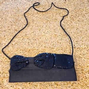 Black bow evening bag. Clutch